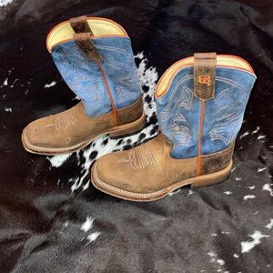 Boys blue, brown, and orange Anderson bean boots.